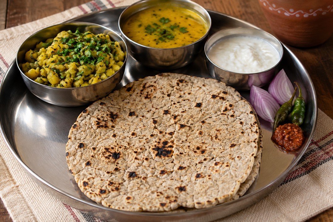 Traditional jowar bhakri served as part of an Indian meal